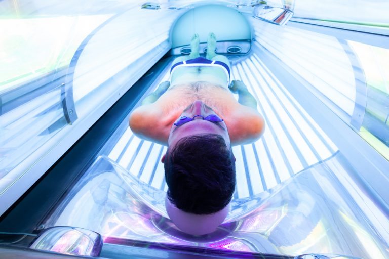 Here are The Best Positions to Lay in a Tanning Bed for an Even Tan