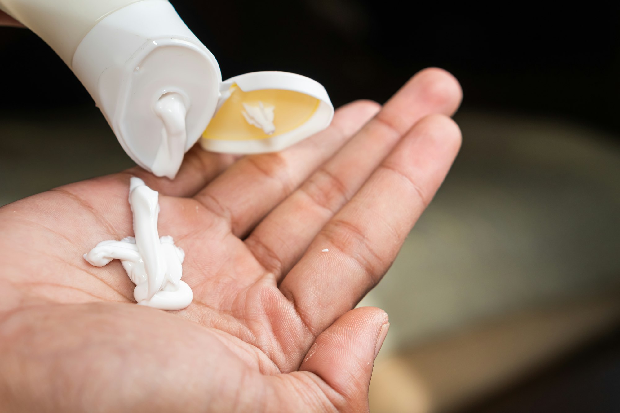 Applying Lotion from a Tube onto Hand